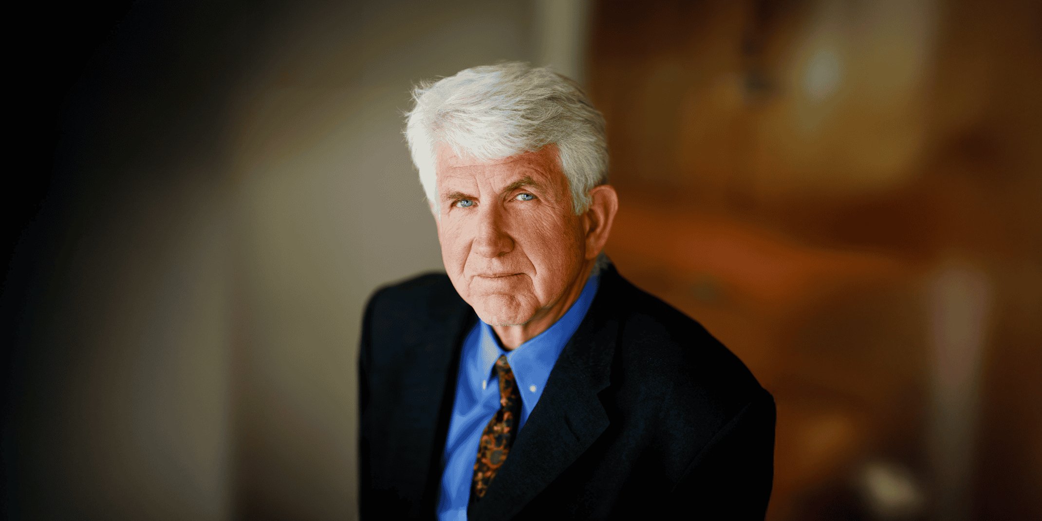 Photo of Bob Metcalfe on a decorative background.
