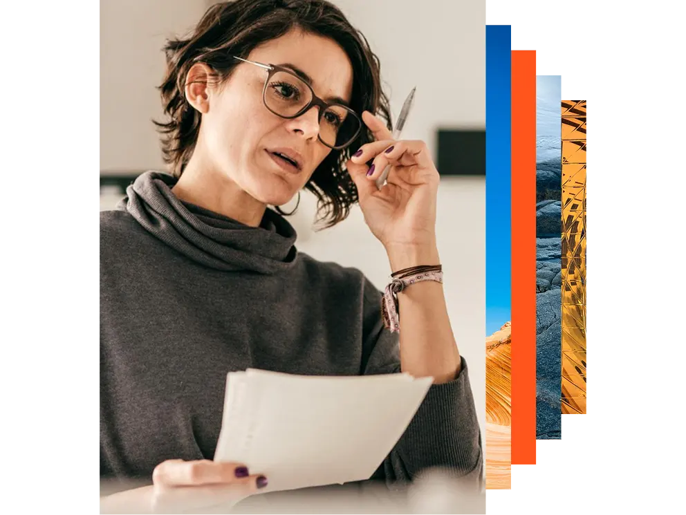 Woman wearing glasses working from home office