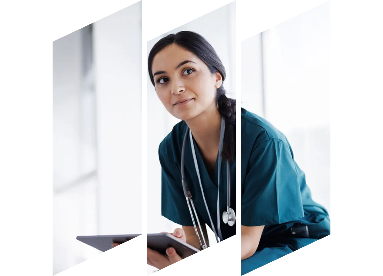 Female healthcare professional looking at a digital tablet