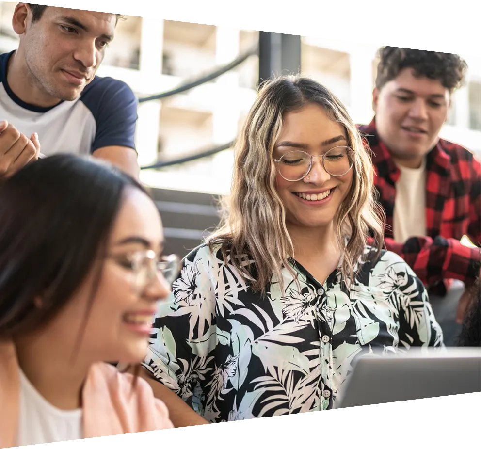A group of students working together around a table
