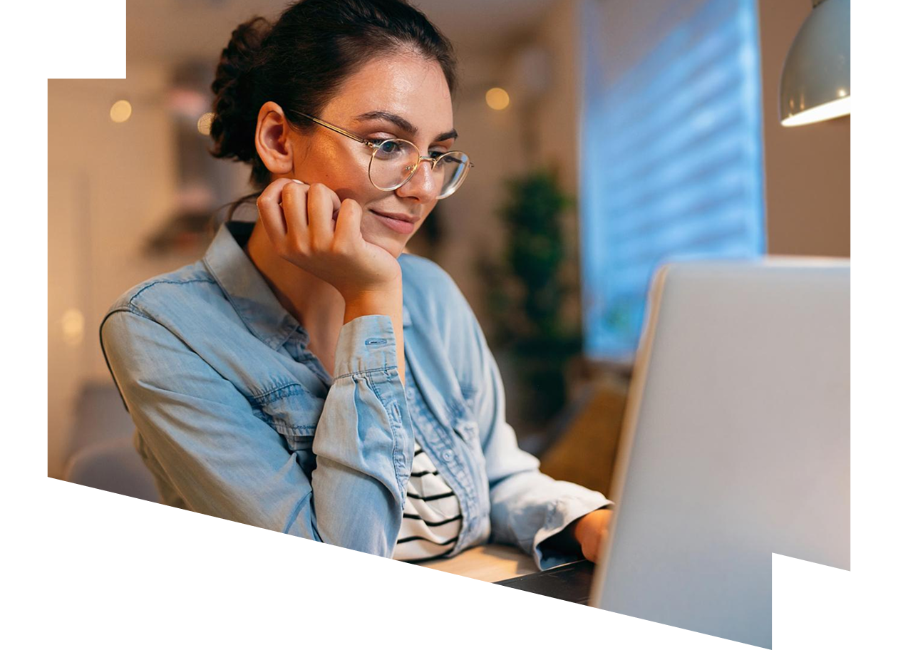 Young Caucasian woman, using laptop while working from home