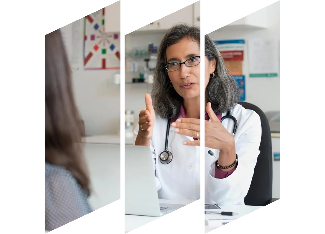 Doctor discussing a case with another medical professional