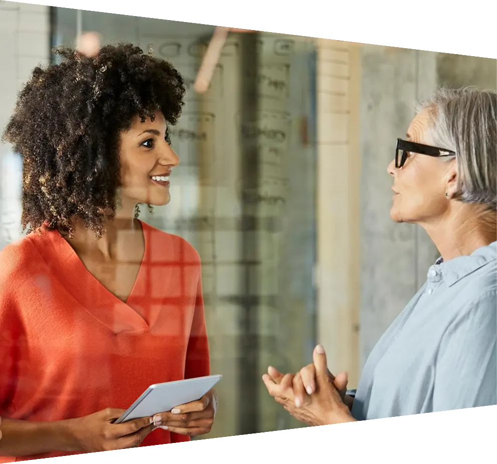 Programmers cooperating working at information technology company