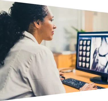 Clinicians reviewing digital medical imagery