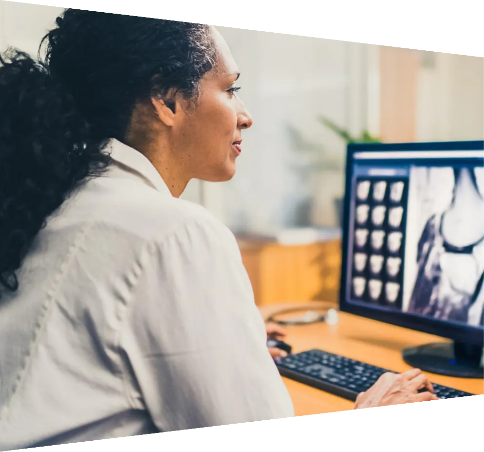 Clinicians reviewing digital medical imagery