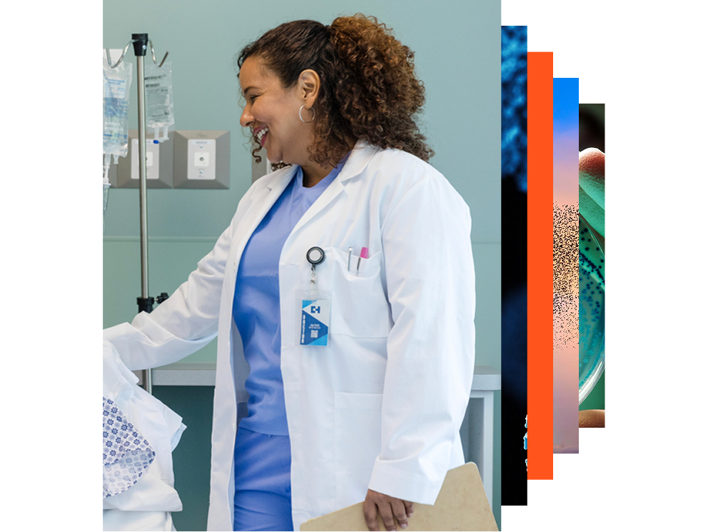 Female doctor with stethoscope looking at a window