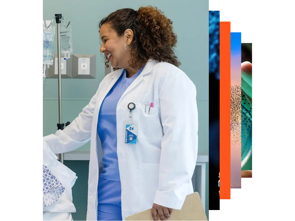 Female doctor with stethoscope looking at a window
