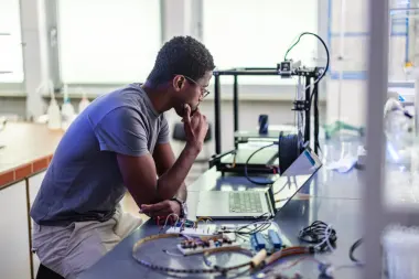 Young Designer During His Work In Laboratory