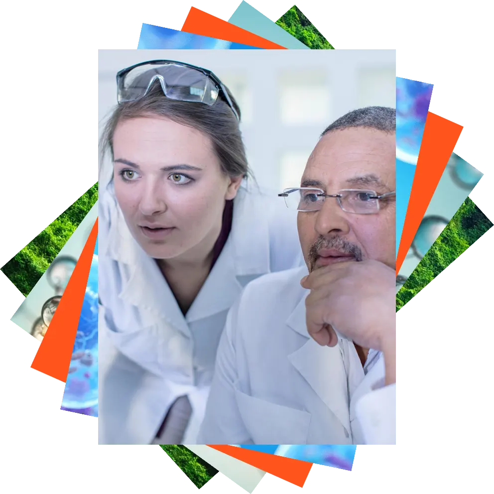 Researchers looking toward a computer monitor