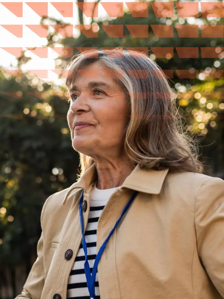 Female professor standing outdoors on a university campus