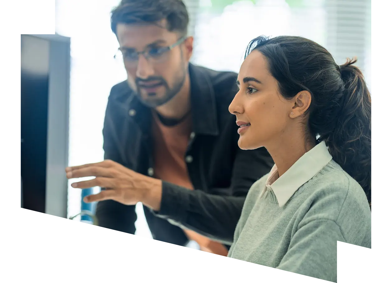 Two men looking at a tablet