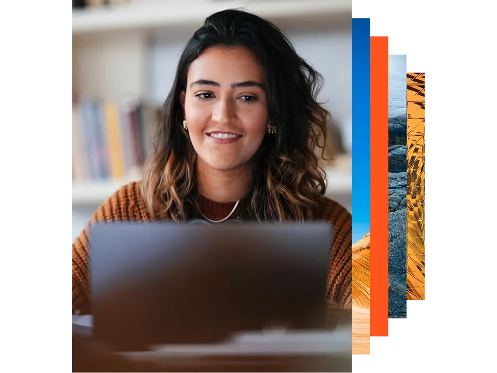 Young Woman Studying with Laptop in Library