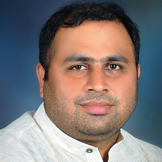 Dr. Santosh K.V.