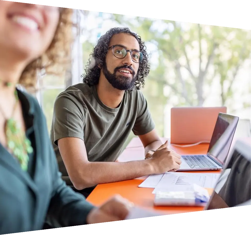 Close up of businessman writing down formulas