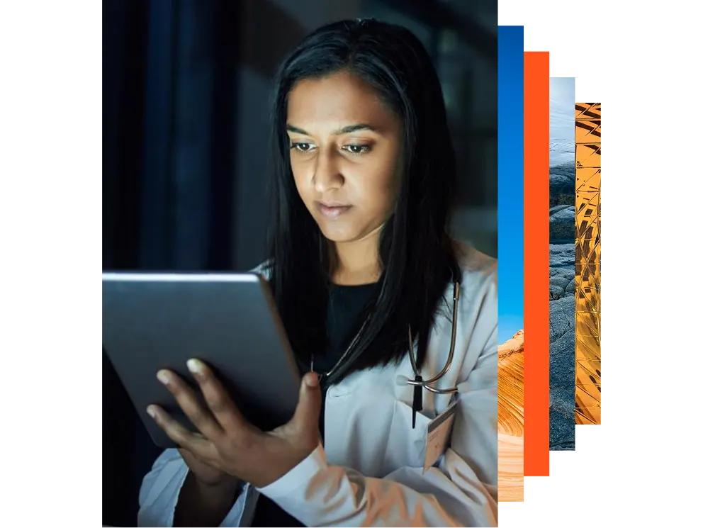Shot of a young female using a digital tablet in an office at night