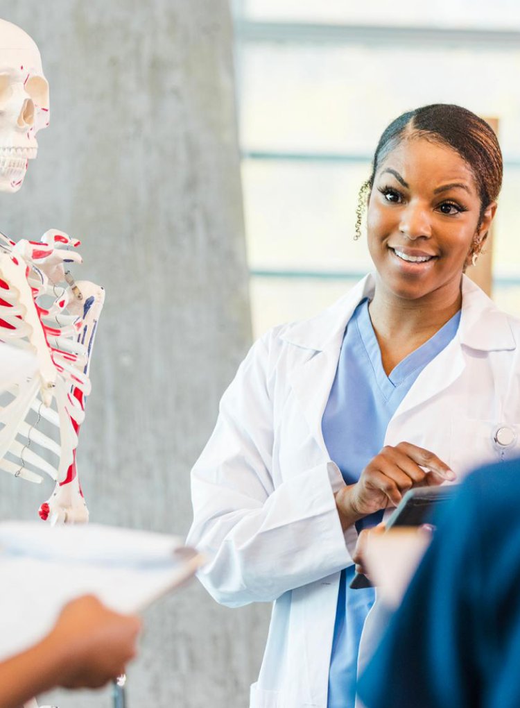 anatomy professor with students portrait