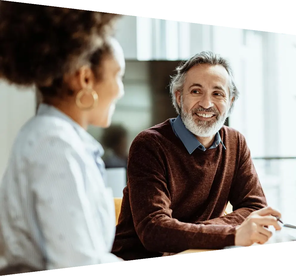 Business people dressed in smart casual clothing working in office