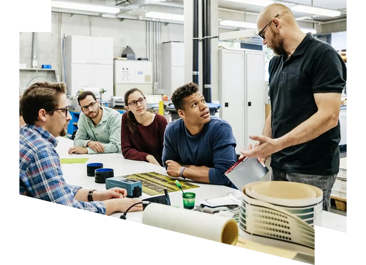 A man conducting a team discussion.