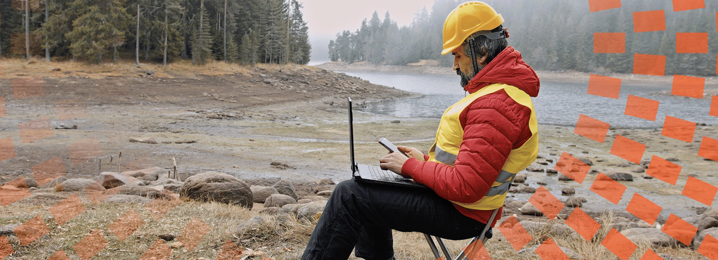 Man using laptop in remote area