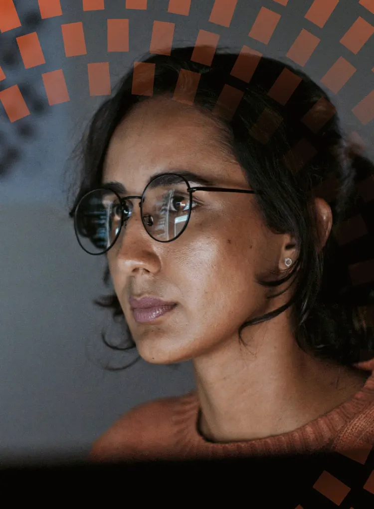 Young researcher looking intently at computer screen