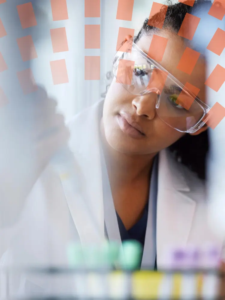 Close-up of female scientist working in a lab