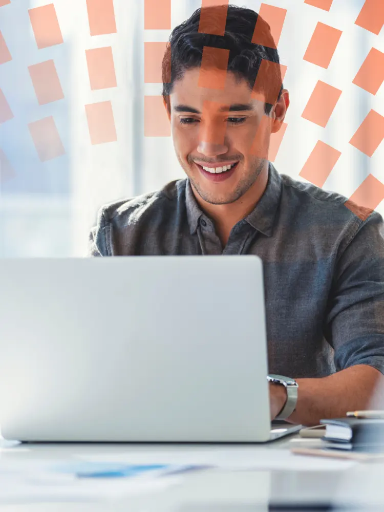 Young editor using a computer in his home office