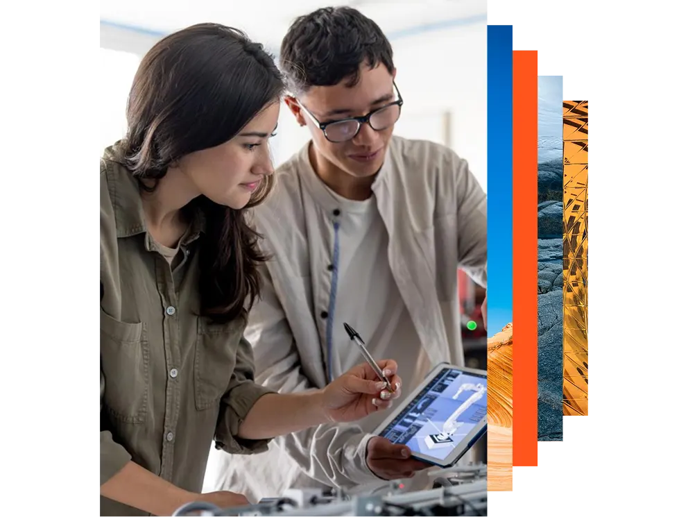 Two students building a robotic arm in a STEM class