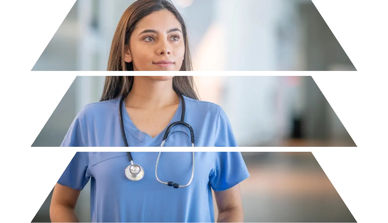 Nurse in blue scrubs looking thoughtful