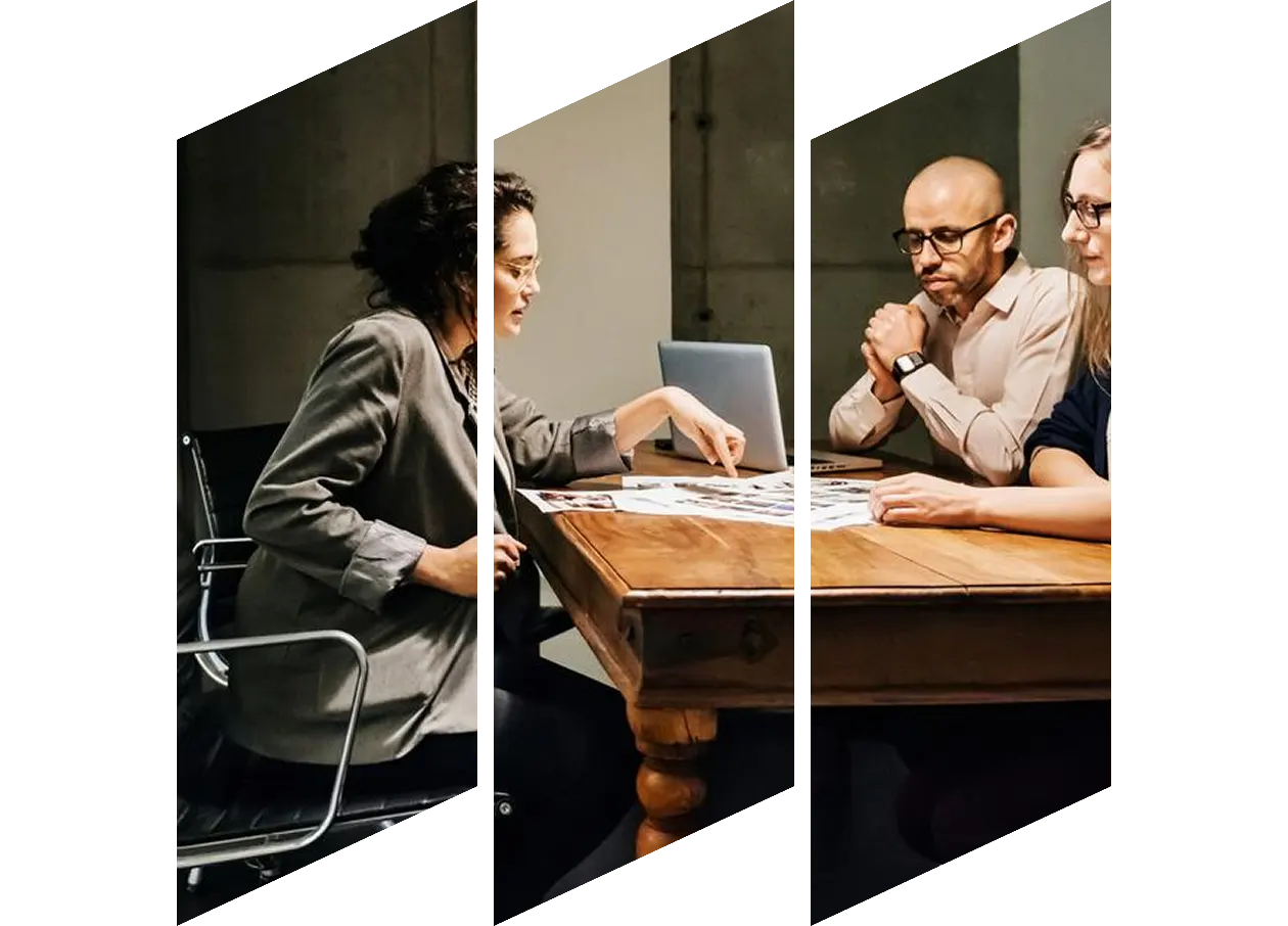 Group of people having a discussion around the table