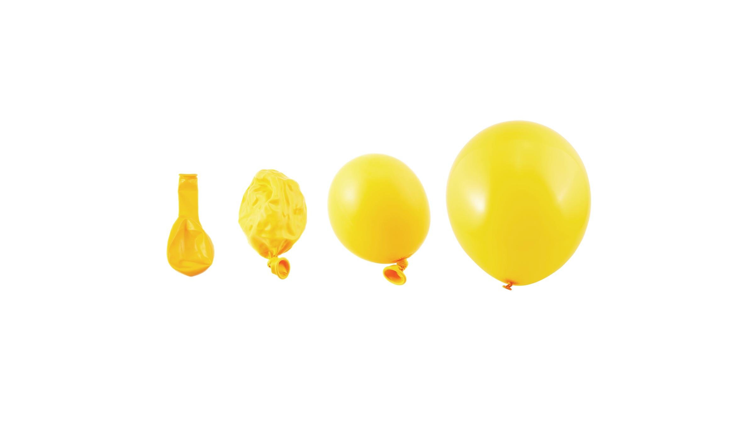 Gelbe Ballons in verschiedenen Stadien, die unterschiedliche Lungenzustände darstellen