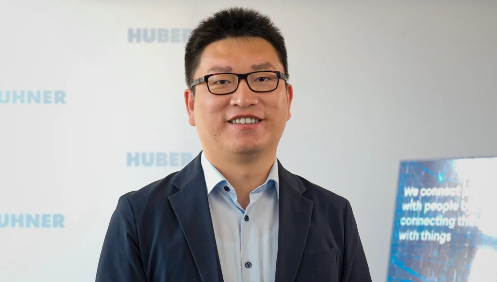 Fio Lu, VP Sales Industrials Man smiling to camera