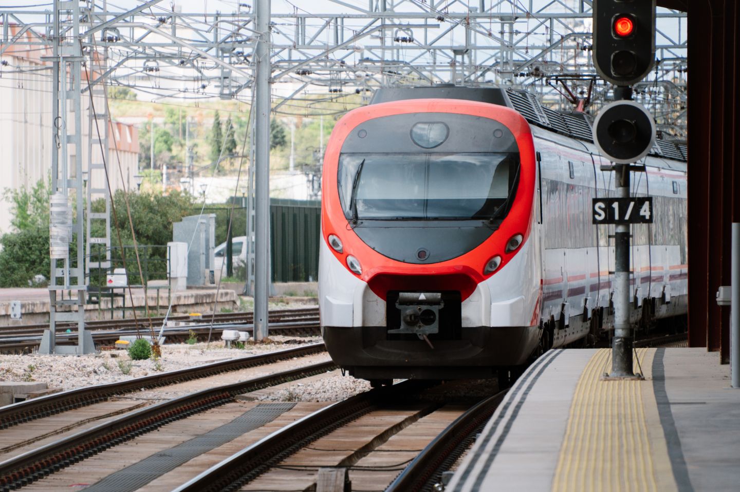 Modern passenger train entering station