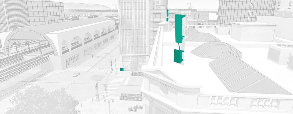 Rooftop small cell antenna installation in a city setting, supporting mobile network coverage and capacity.