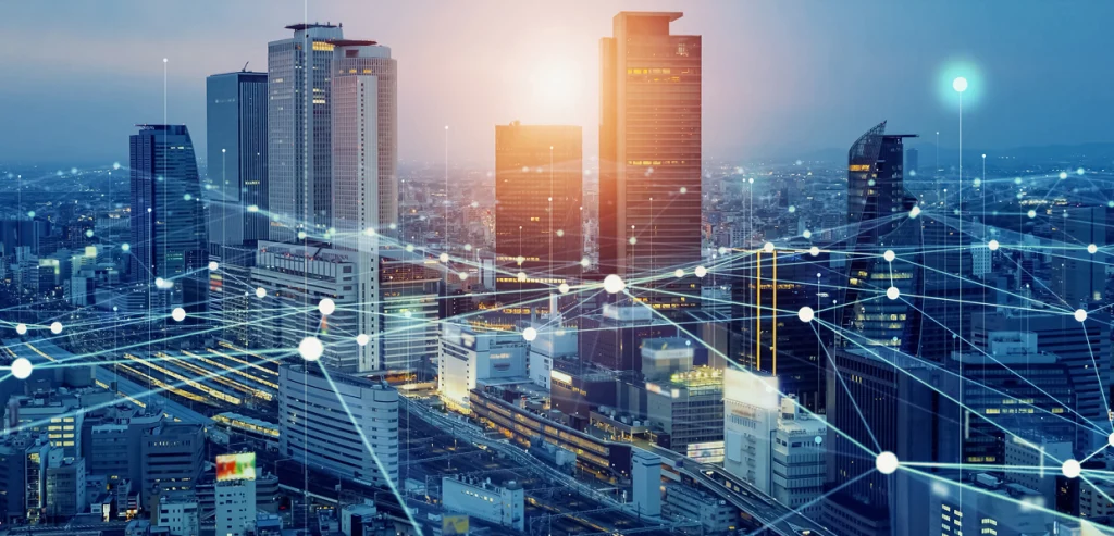 Smart city skyline with connected network technology illustrating optical circuit switching in telecom, AI, and data infrastructure Smart city skyline with connected network technology illustrating optical circuit switching in telecom, AI, and data infrastructure