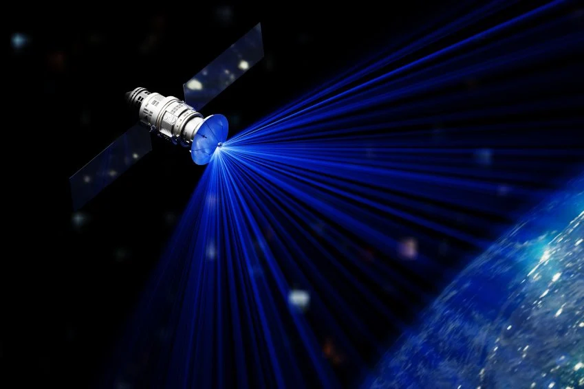 Satellite in space sending signal to earth Satellite in space sending signal to earth