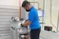 production employee working in Malaysia