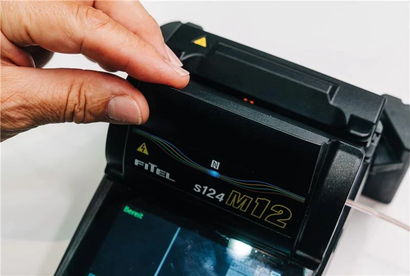 Hand closing the splicer flap