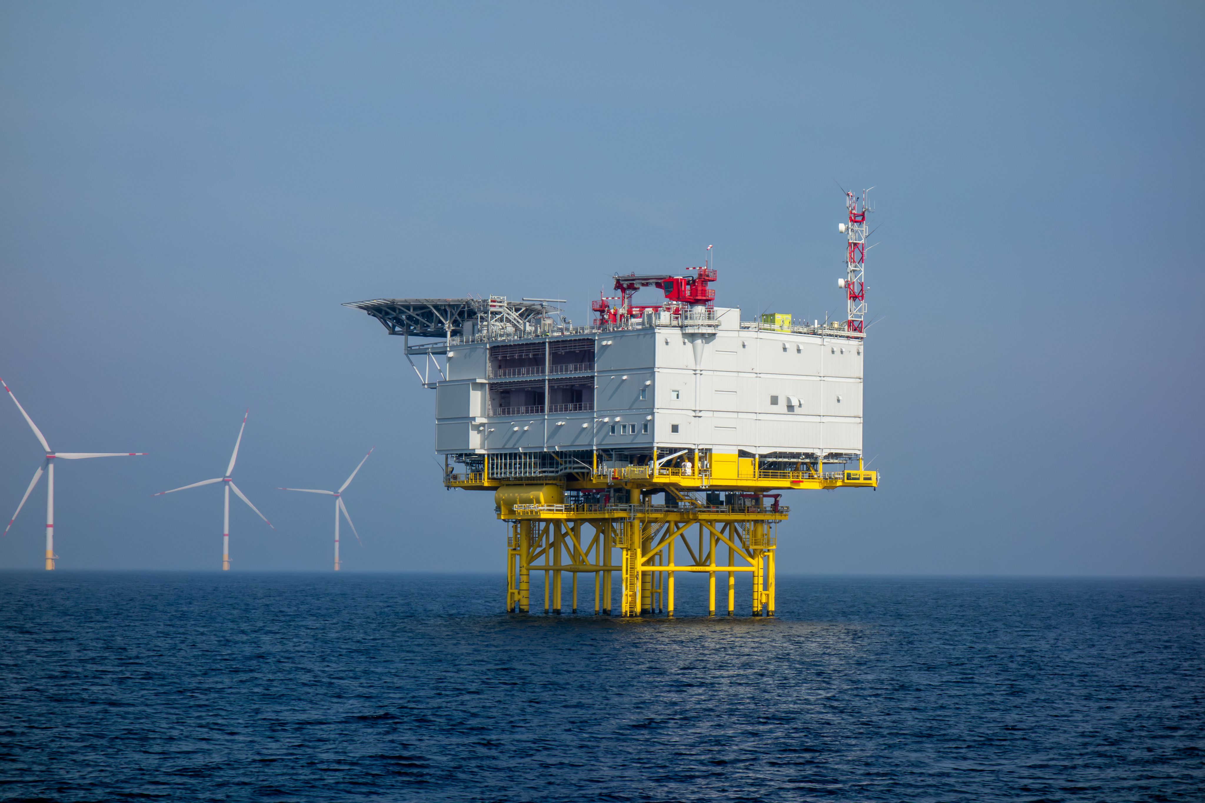 Offshore Wind Farm and Energy Platform in Open Sea. 