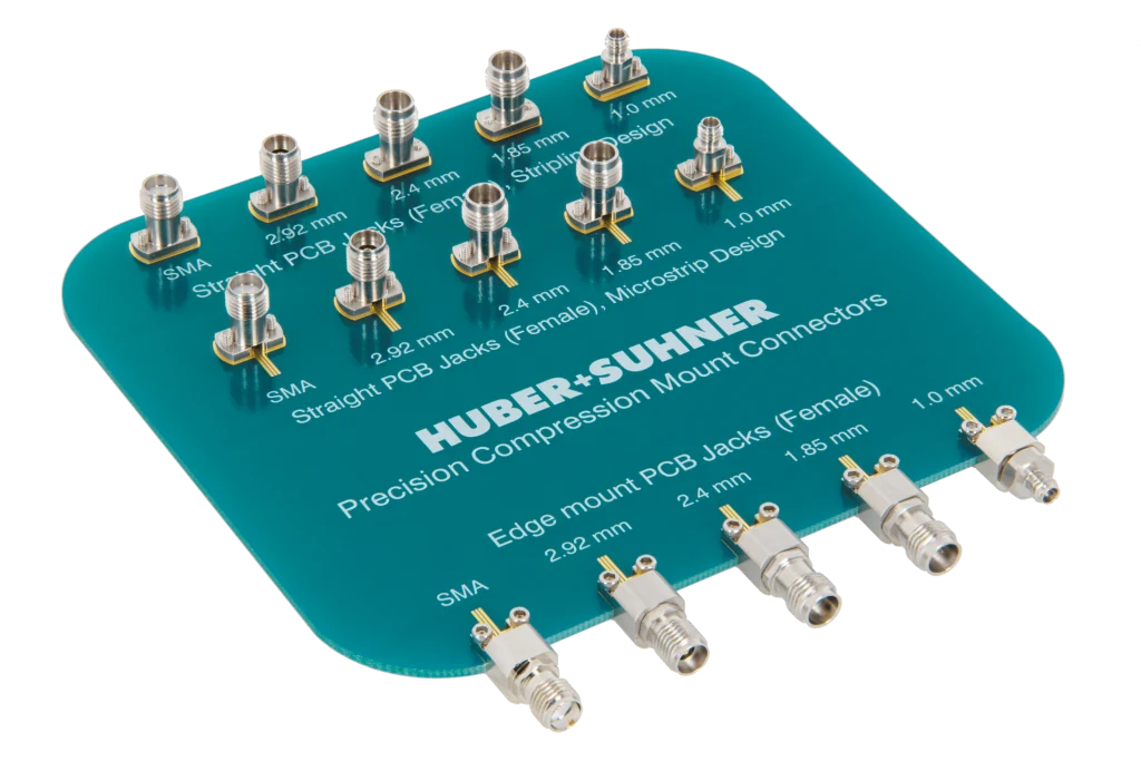 HUBER+SUHNER unternimmt einen entscheidenden Schritt in der Koax-Leiterplatten-Verbindungstechnik mit völlig neuen Präzisions-Kompressions-Steckverbindern