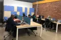 5 people working in an office in Malaysia