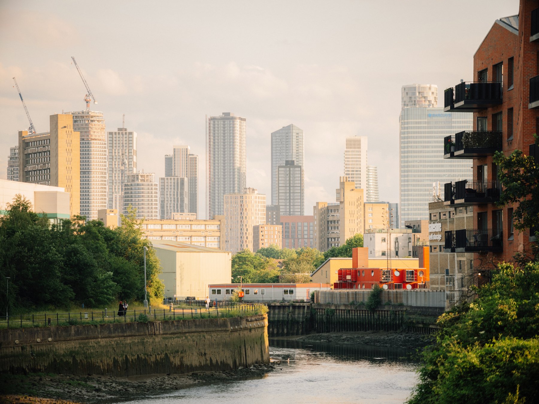 The River Lea winds along Tower Hamlets, opening up views of Canary Wharf. Image by Freya Najade.