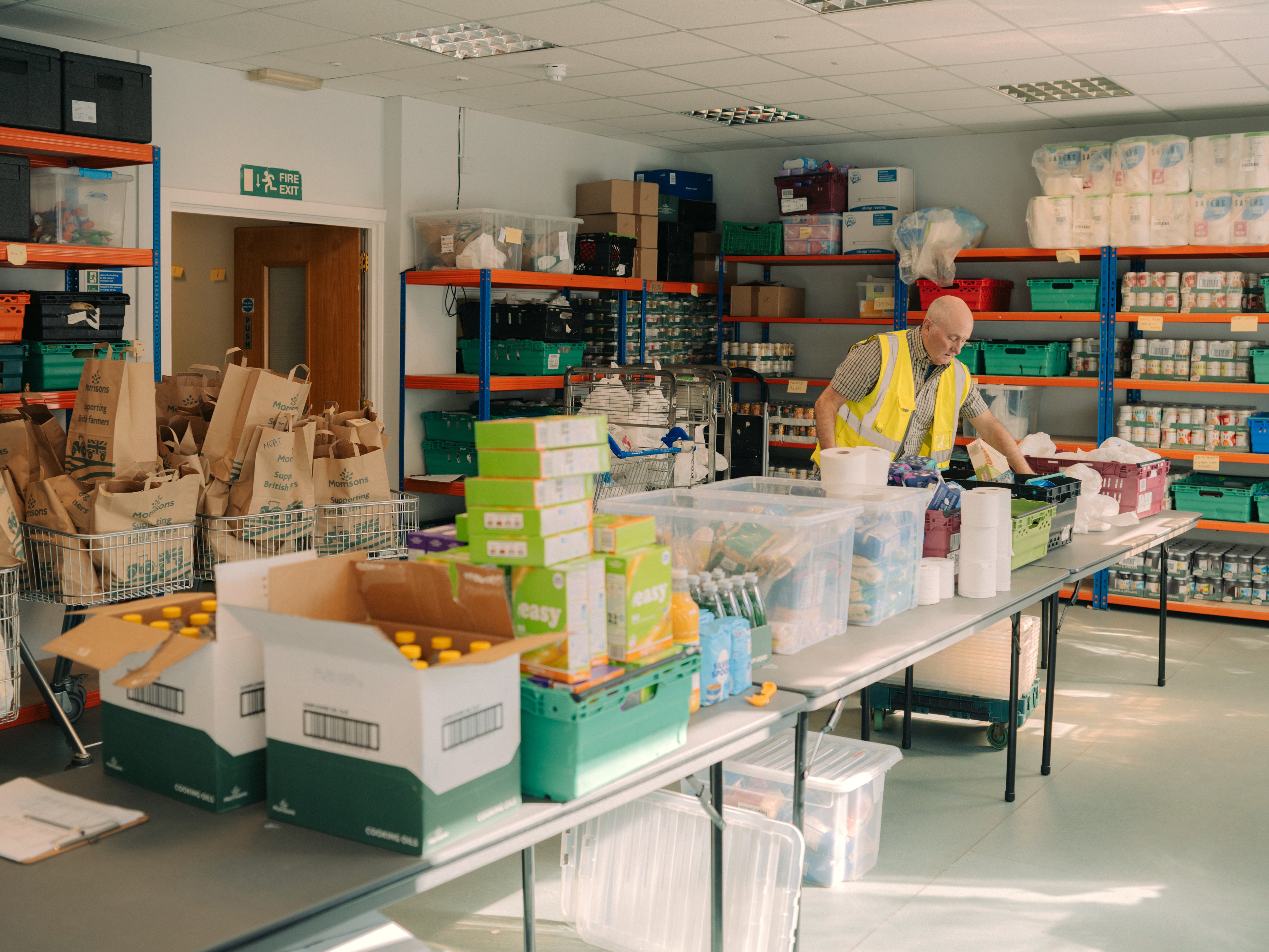 Man unpacking food at food bank