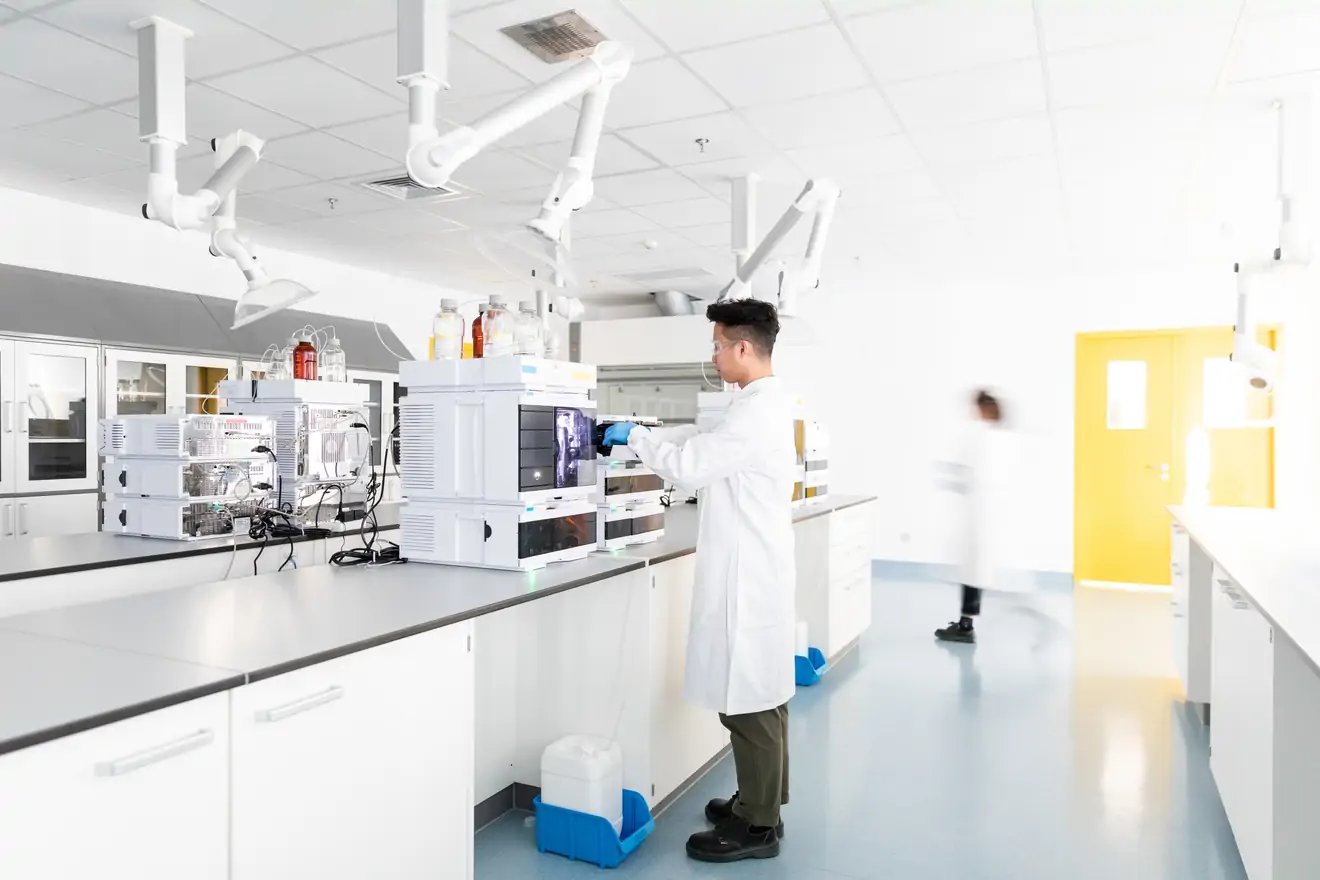 tech working in lab - China