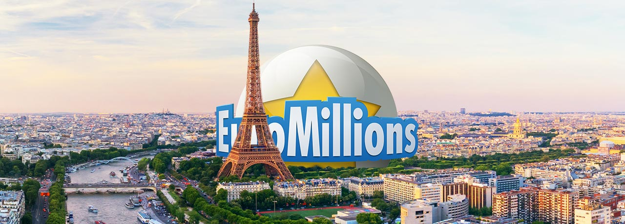 Ira Losco holding EuroMillions logo