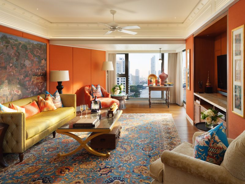 Mandarin Oriental Bangkok - Living room suite in warm orange and terracotta tones