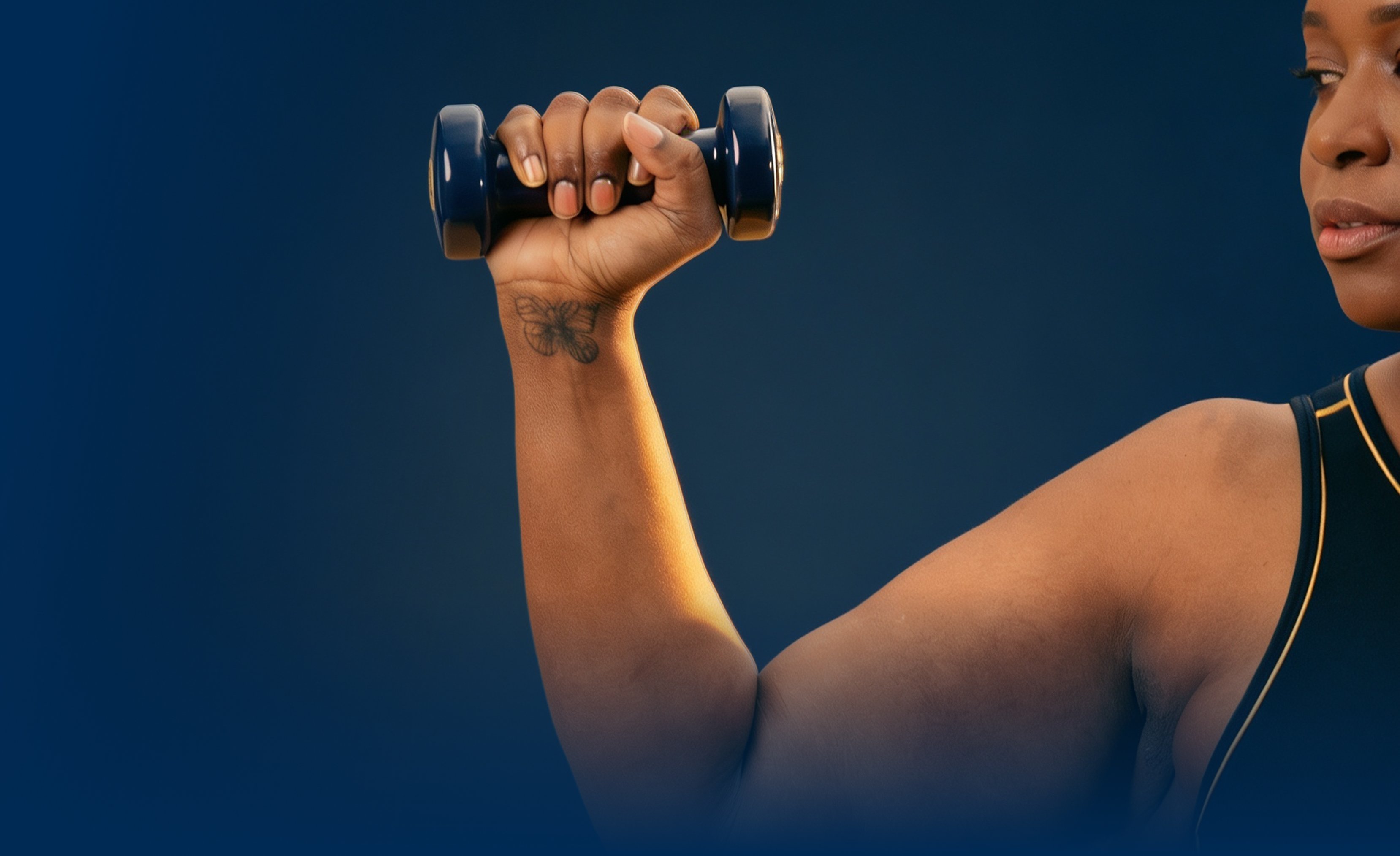 Person lifting a dumbbell, illustrating how Metagenics® StayStrong™ collagen supplements combine collagen with complementary ingredients to support strength and movement.