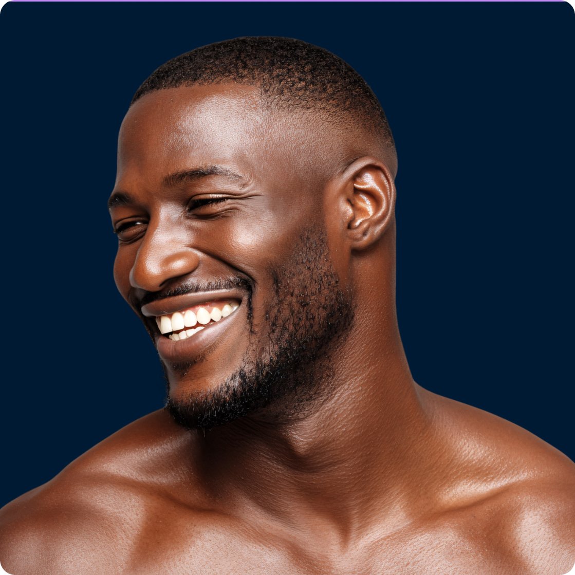 Portrait of a smiling adult man with bare shoulders against a deep blue background, conveying confidence, clarity, and emotional well-being. The image represents the mind that guides you, supporting Metagenics messaging about mental wellness as you reset your routine during the new year supplement sale.