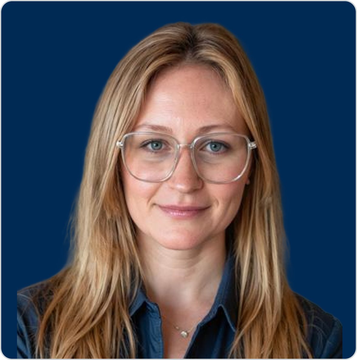 Portrait of Dr. Melissa Blake, ND, Metagenics naturopathic doctor and stress and hormone expert, smiling against a dark blue background.