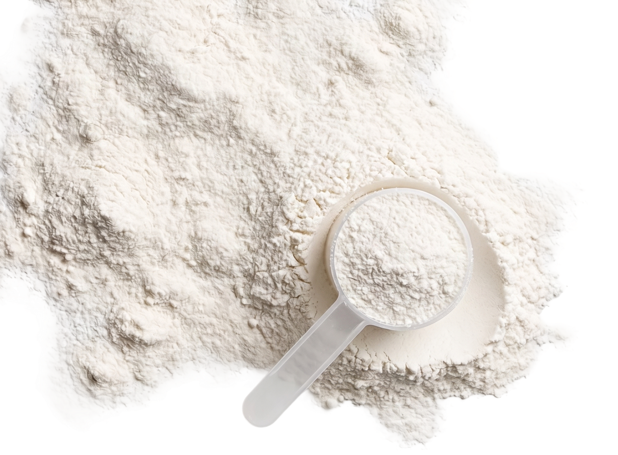 Scoop of collagen powder resting in a pile of fine white collagen powder.