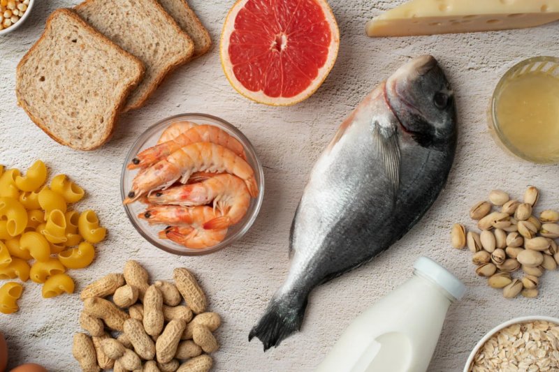 table of foods that include fish, nut, bread, milk, and grain for omega-3 support